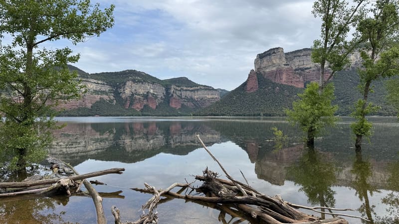 Rocky cliffs in Catalonia reflected in a lake